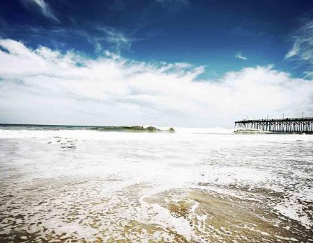 Water on the sand at Carolina Beach